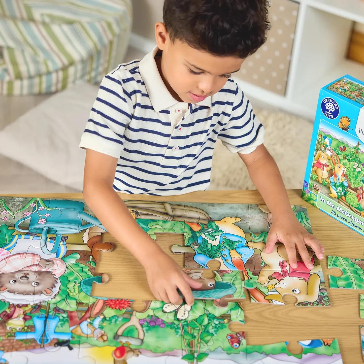 Orchard Toys - Peter Rabbit™ In Mr. McGregor's Garden jigsaw puzzle 25 Pieces