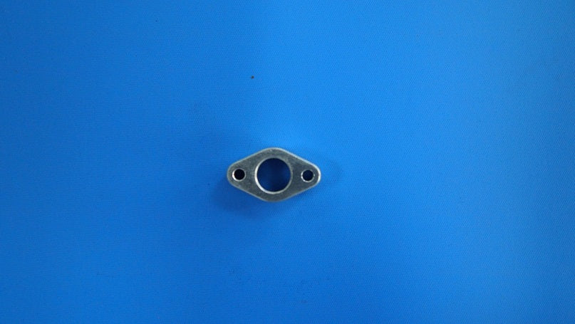 NGH - PART EXHAUST MANIFOLD ADAPTER F60i2 NHF60414
